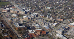 an aerial view of large buildings and homes in park ridge